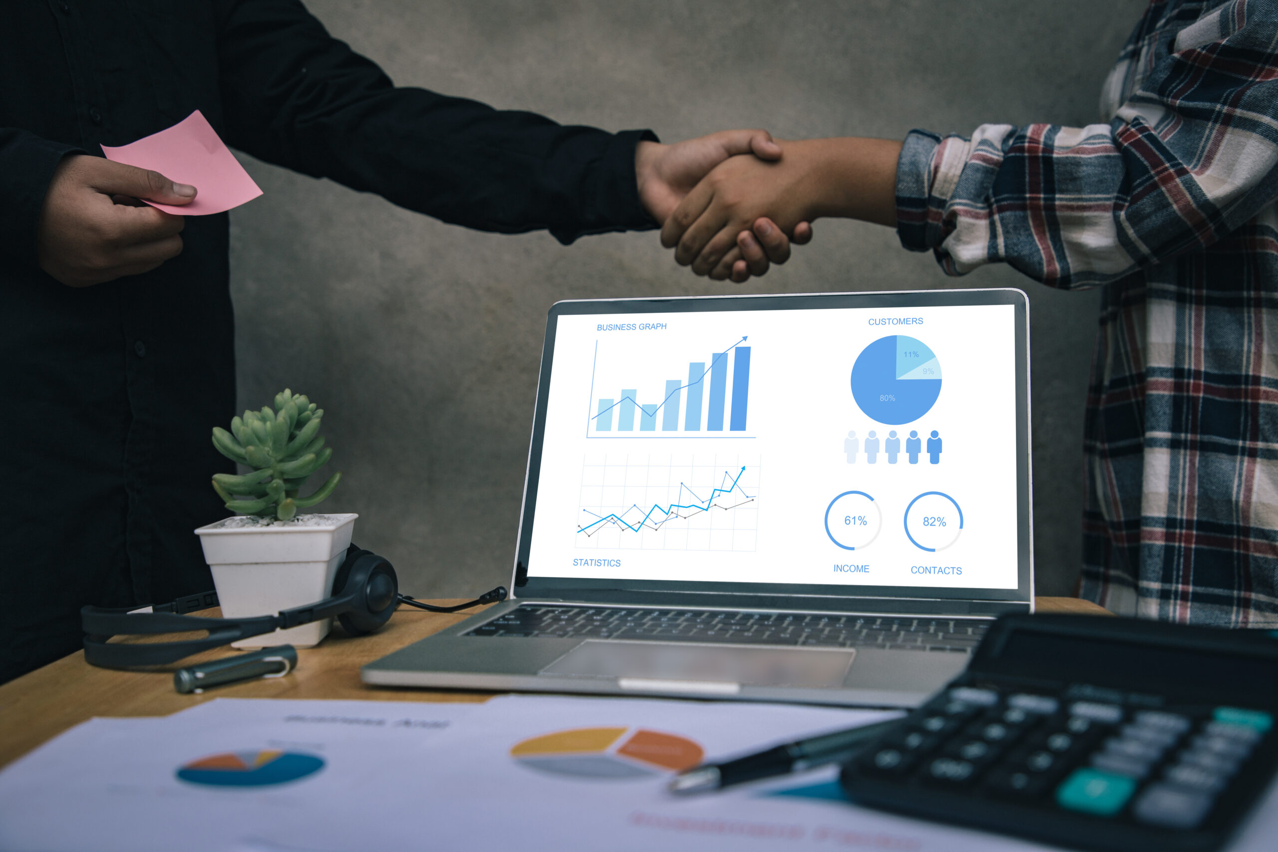 Investors shaking hands